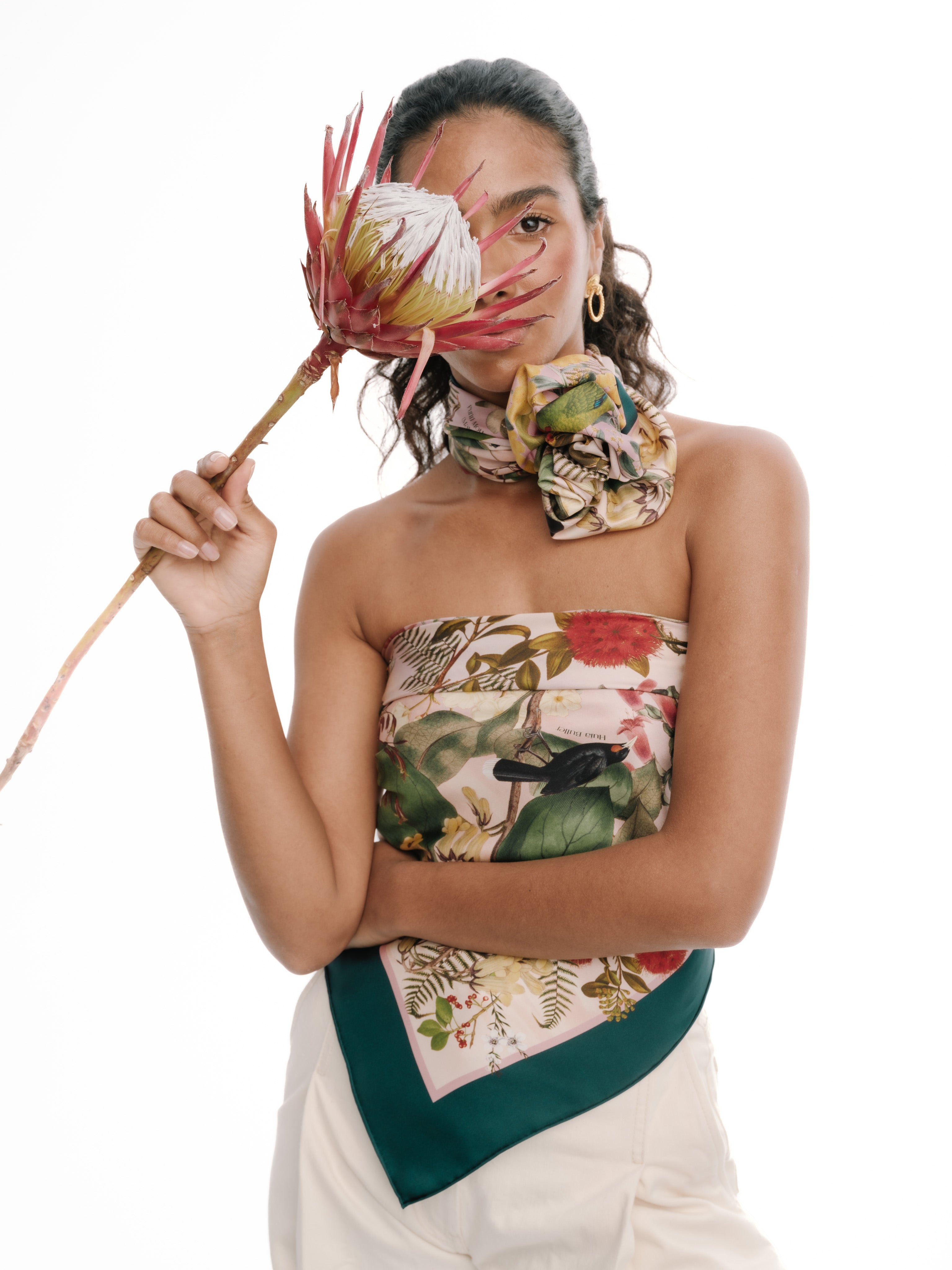 Women-with-flower-wearing-floral-scarf