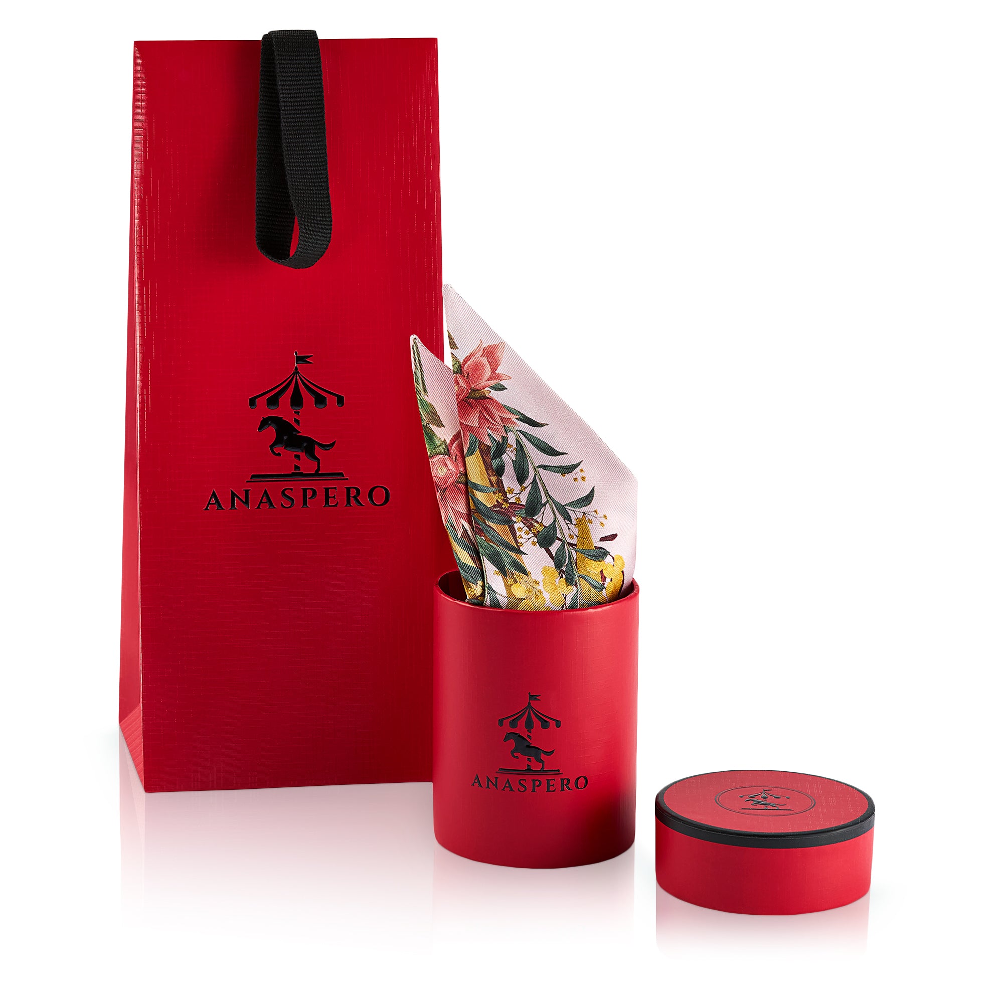 Red Anaspero packaging with a cylindrical box and floral design silk twilly on a white background