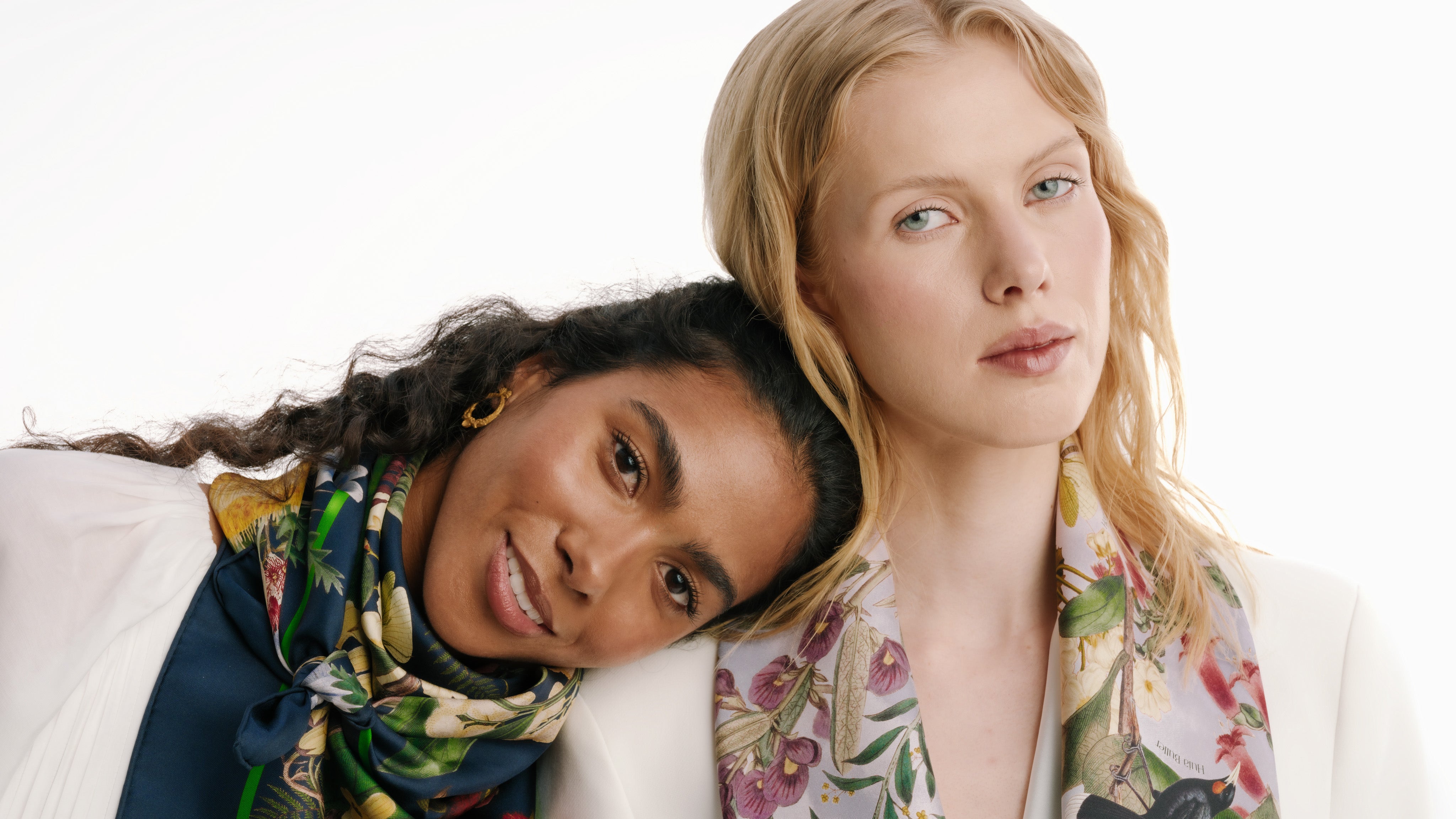 two-women-with-floral-silk-scarves