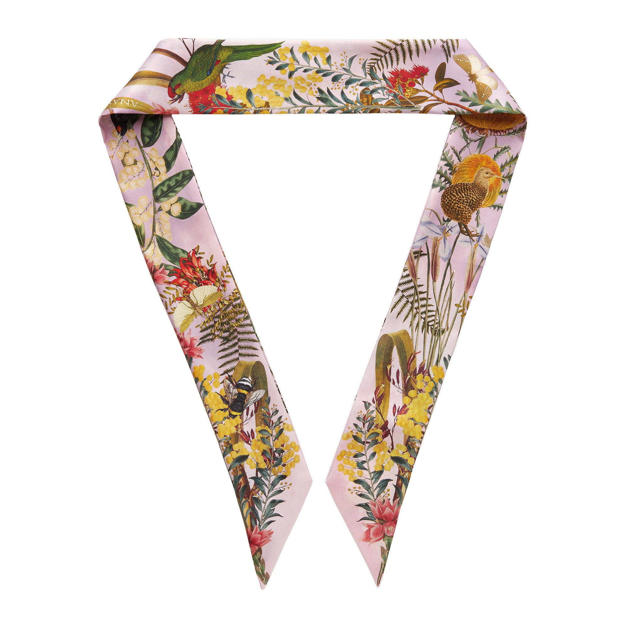Feminine floral and parrot patterned scarf on a white background